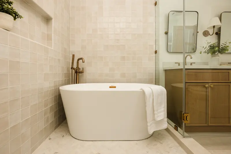 Freestanding soaking tub in the primary bath